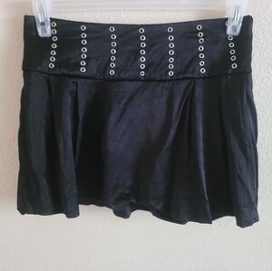 Bebe Black Mini Skirt with Eyelet Accents